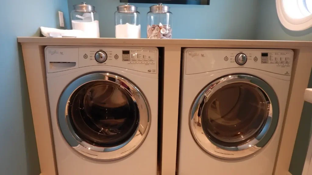 Home laundry room with washer and dryer