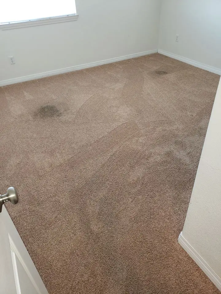 Before: Stained bedroom carpet