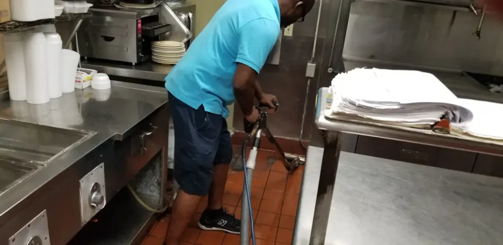 Tile floor cleaning in progress